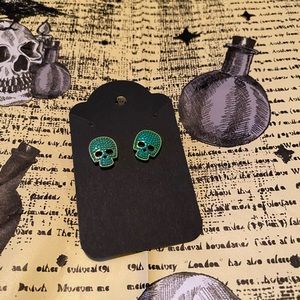 Green skull earrings